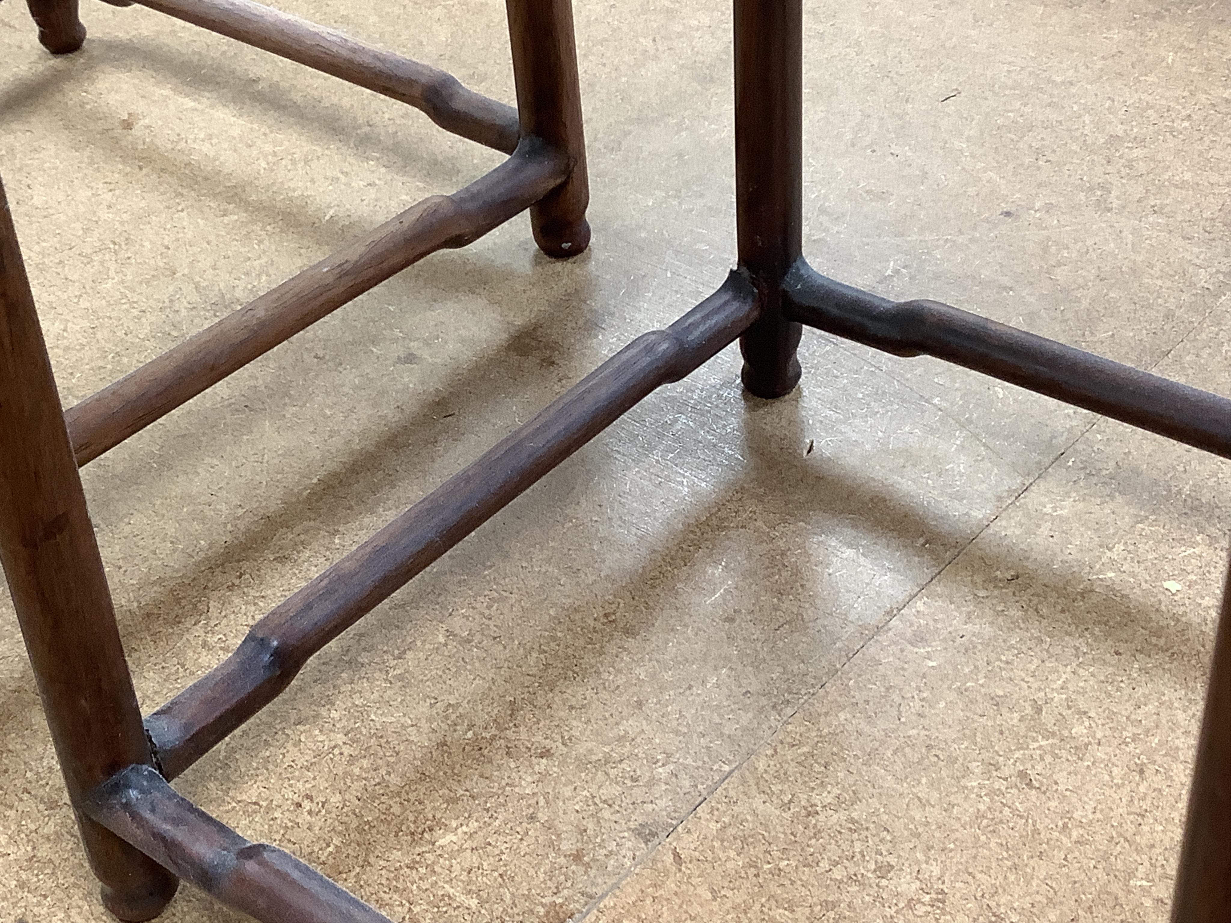A nest of five Chinese hardwood stands, tallest (largest) 32cm high